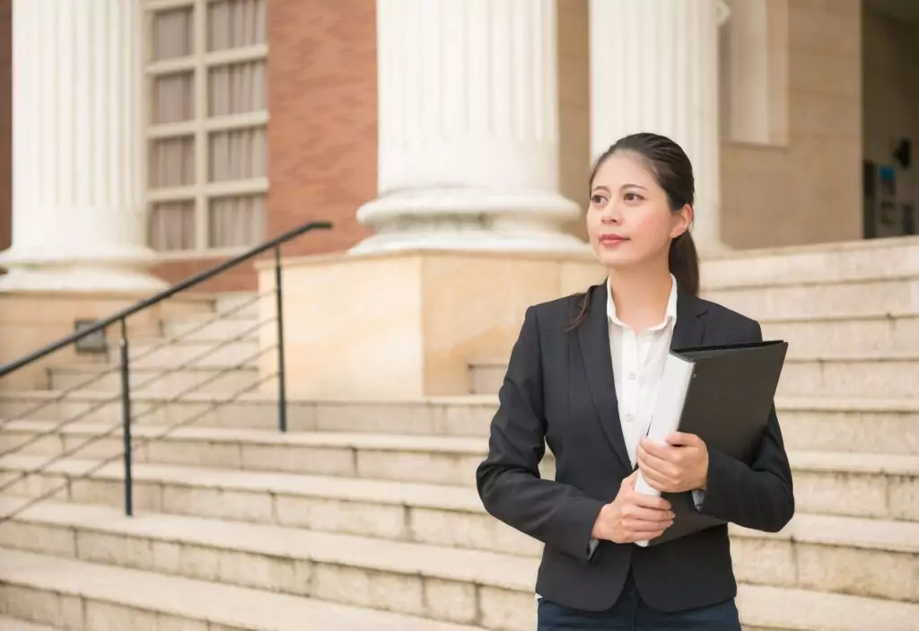 lawyer woman standing in front of the court